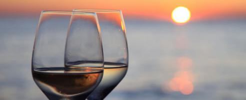 Glass of Wine Against Sunset
